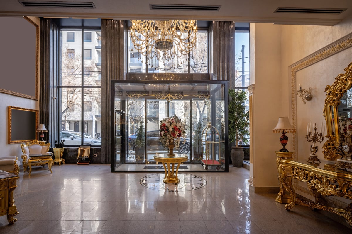 Elegant hotel reception with marble flooring - Manhattan building entrance